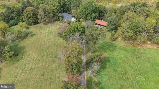 a bird view of building and green space