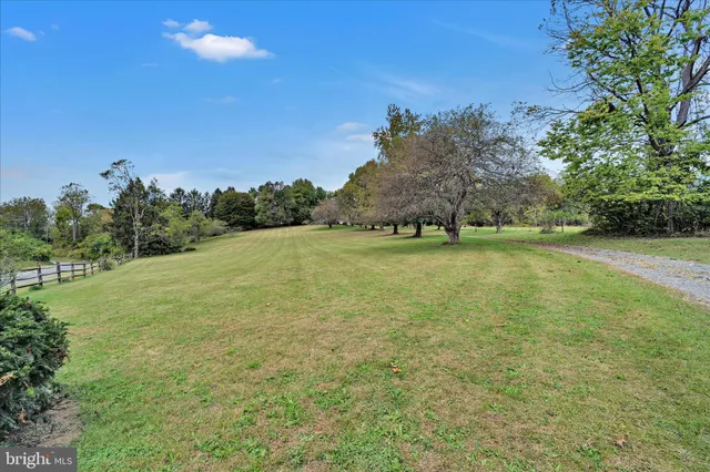 a view of a field with an outdoor space