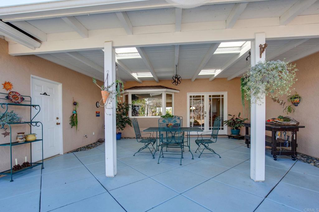 3326 Monroe Street Carlsbad, CA 92008 - Photo 29 of 63 a view of a dining area with furniture window and outside view