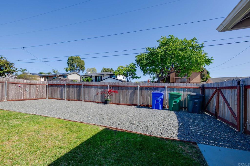 3326 Monroe Street Carlsbad, CA 92008 - Photo 41 of 63 a view of a backyard with wooden fence