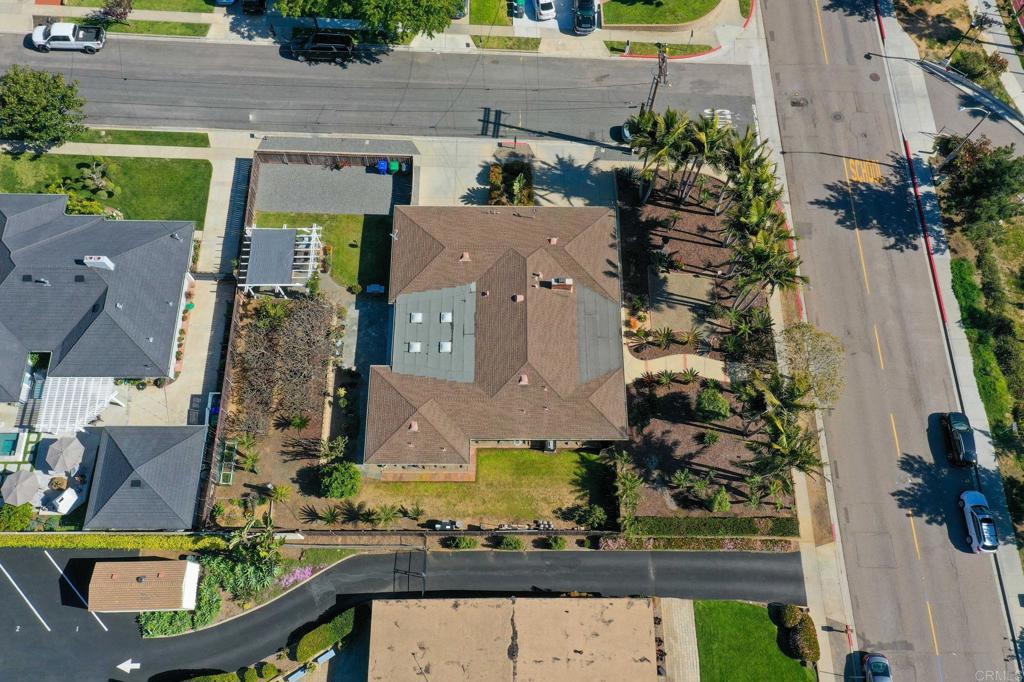 3326 Monroe Street Carlsbad, CA 92008 - Photo 55 of 63 an aerial view of multiple houses with a yard