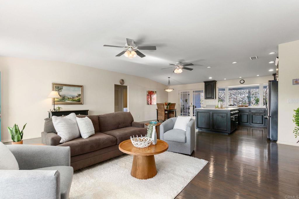 3326 Monroe Street Carlsbad, CA 92008 - Photo 10 of 63 a living room with furniture and kitchen view