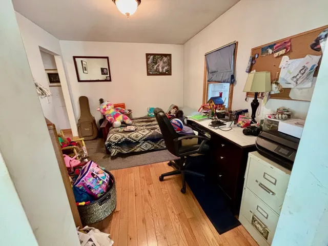 a view of a workspace with furniture