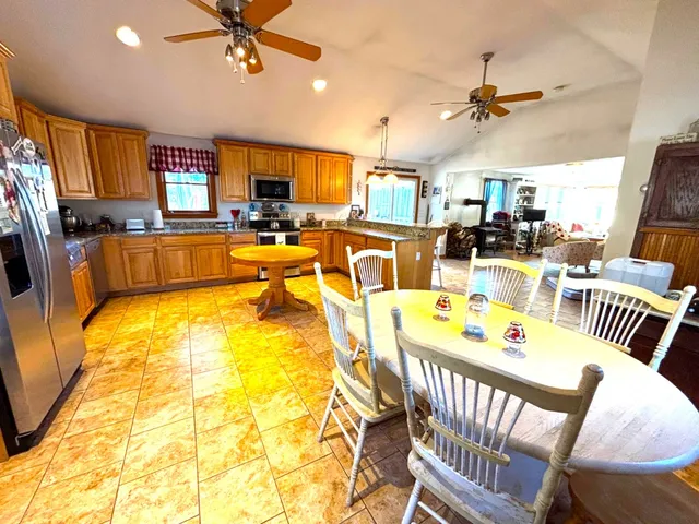 a view of a dining room with furniture
