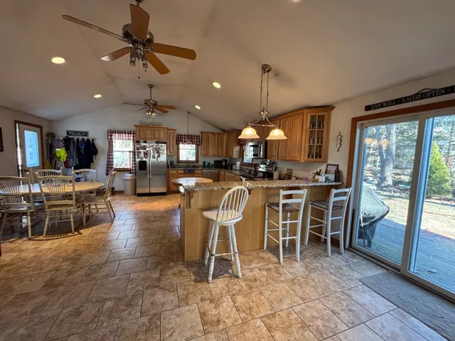a view of a dining area with furniture window and wooden floor