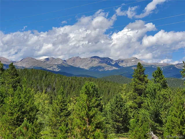 a view of lake and mountain