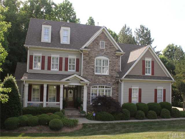 7305 Sparhawk Road Wake Forest, NC 27587 - Photo 1 of 25 GORGEOUS CUSTOM BUILD ON ARGUABLY THE NICEST LOT IN ST IVES. BEAUTIFUL STONE WORK AND METICULOUS LANDSCAPE AND DETAIL. WONDERFULLY MAINTAINED BY ORIGINAL OWNERS. Exterior Front
