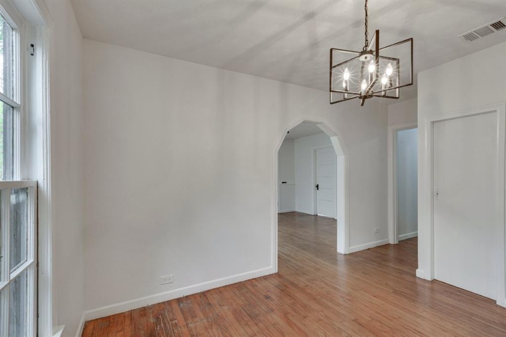 617 Wilson Street Lancaster, TX 75146 - Photo 11 of 30 a view of an empty room and wooden floor