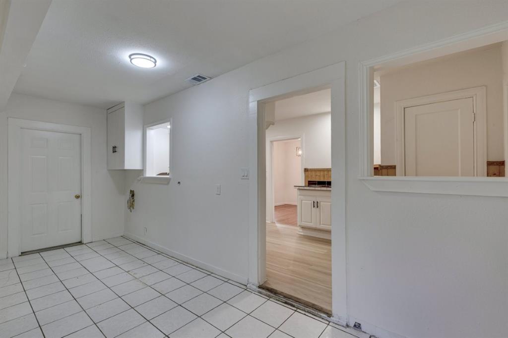 617 Wilson Street Lancaster, TX 75146 - Photo 17 of 30 a view of an empty room and window