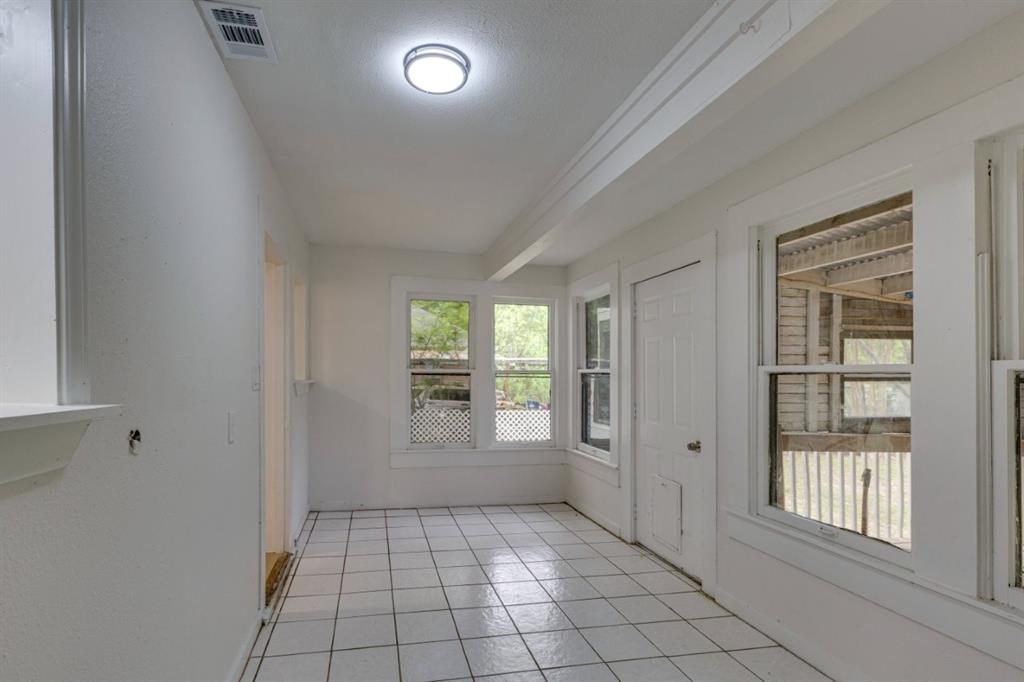 617 Wilson Street Lancaster, TX 75146 - Photo 18 of 30 an empty room with windows