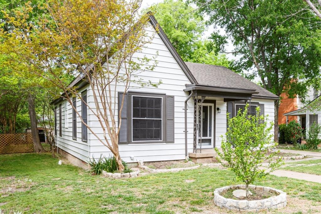 617 Wilson Street Lancaster, TX 75146 - Photo 2 of 30 a view of a house with a yard