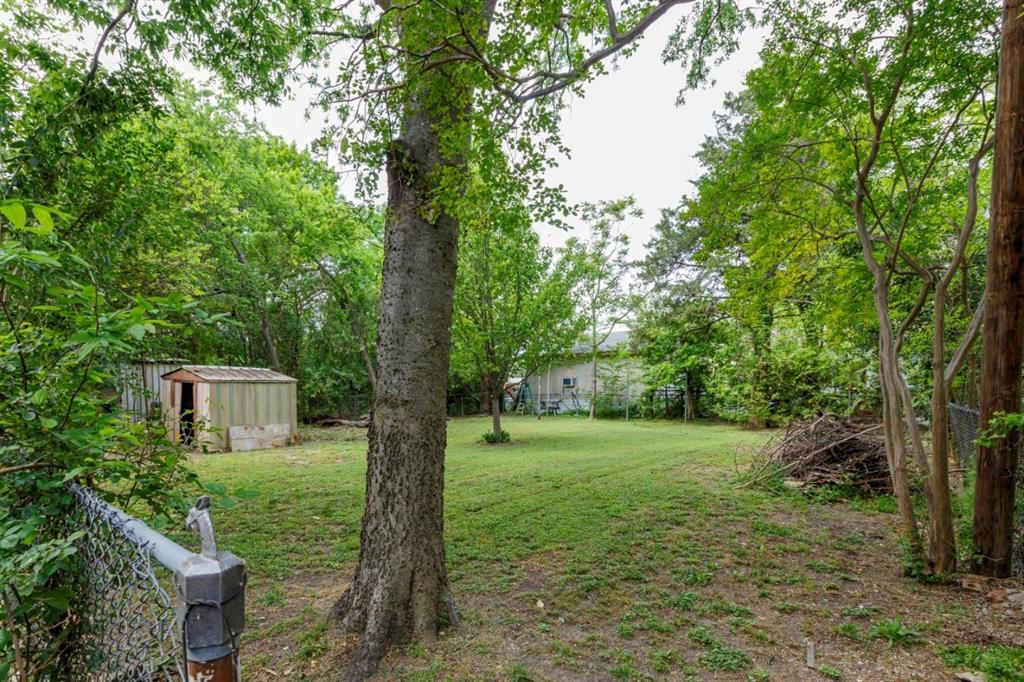 617 Wilson Street Lancaster, TX 75146 - Photo 28 of 30 a view of a house with a backyard