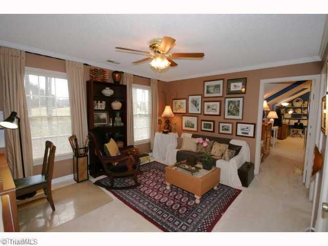 115 Brann Road Browns Summit, NC 27214 - Photo 10 of 16 Other. Part of this house is convertable: here a bedroom is used as an office and beyond in the bonus there are two additional closets which would make a bedroom.