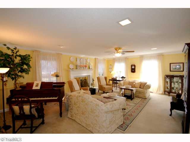 Living Room. Huge Living Room is well lit and has a Fabulous FirePlace!