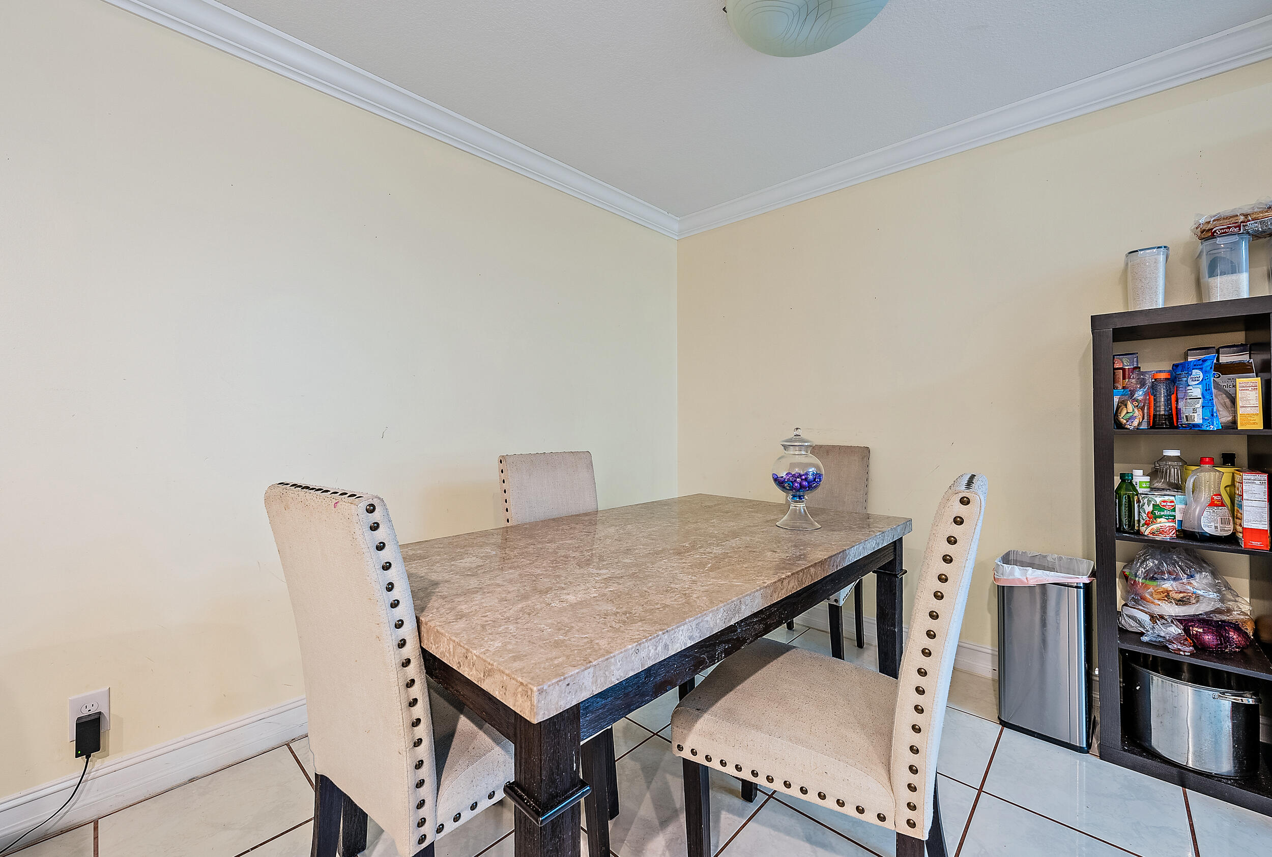 5872 Rambler Rose Way West Palm Beach, FL 33415 - Photo 12 of 30 a room with furniture and a book shelf