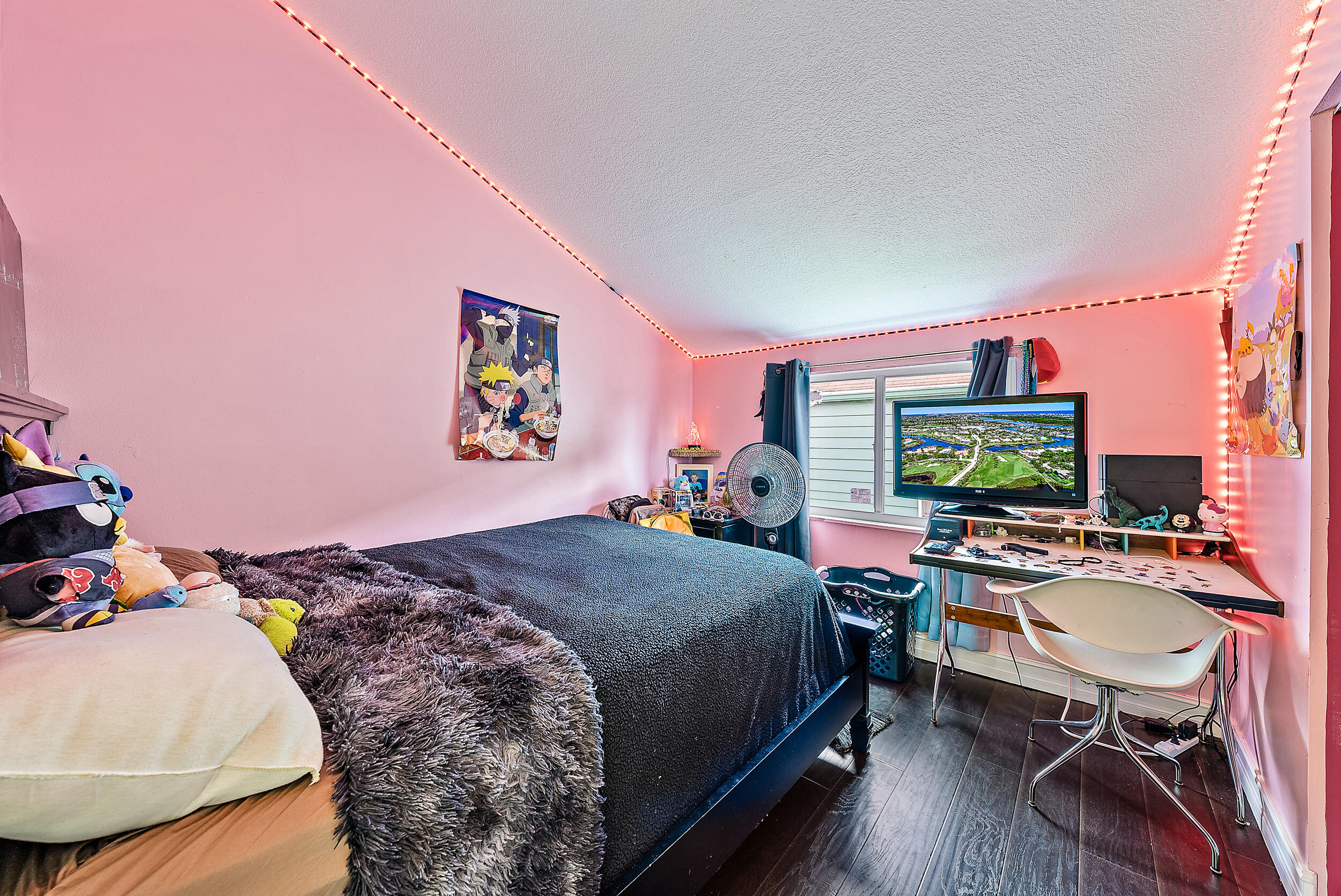 5872 Rambler Rose Way West Palm Beach, FL 33415 - Photo 19 of 30 a bedroom with a bed window and a table in it