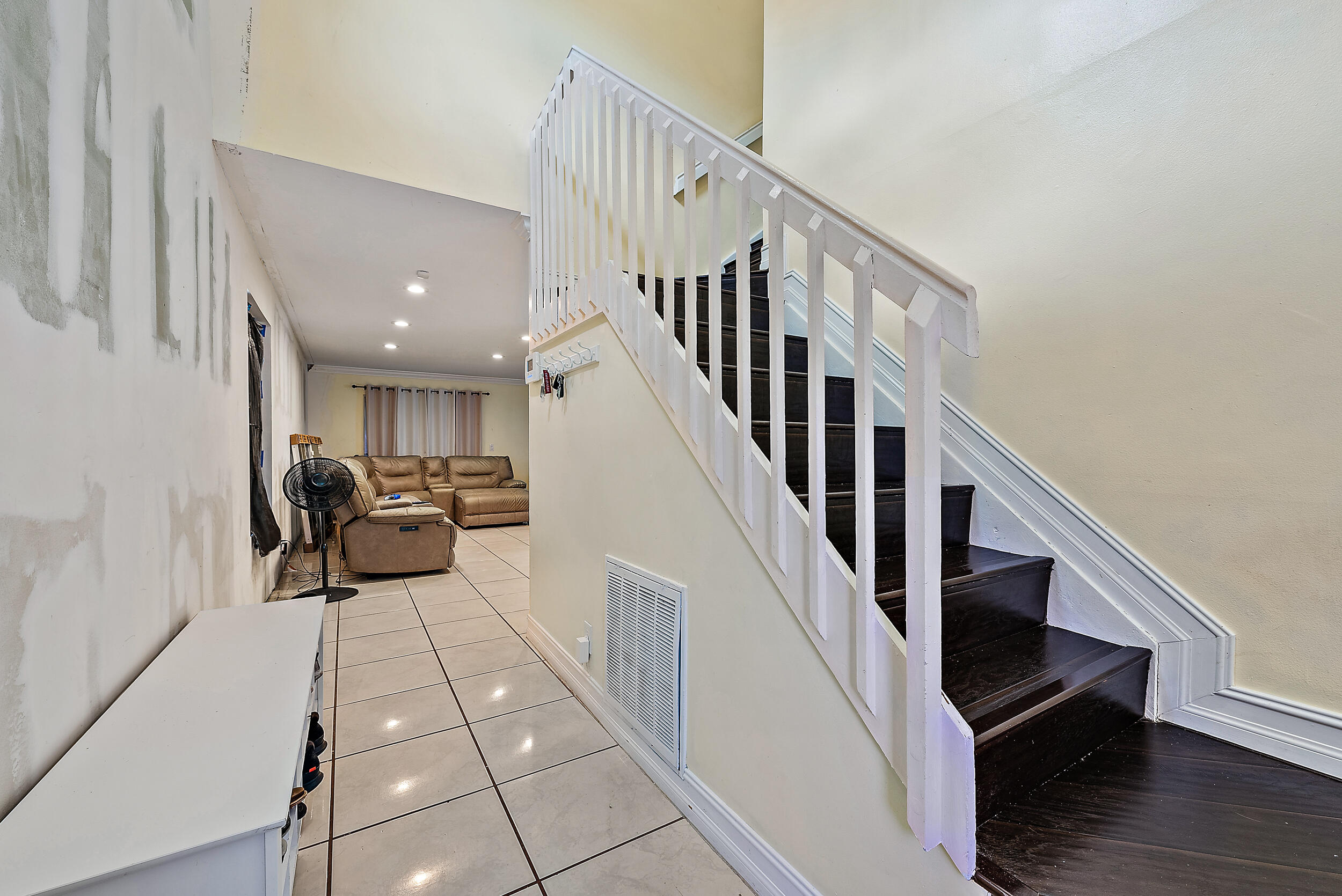 5872 Rambler Rose Way West Palm Beach, FL 33415 - Photo 6 of 30 a view of a livingroom with furniture and stairs