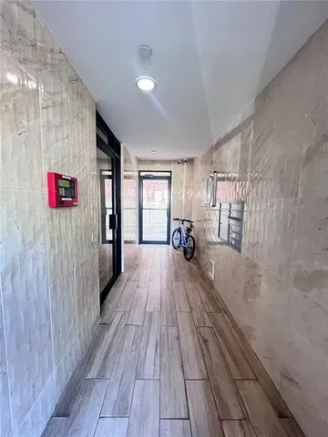 a view of entryway with wooden floor