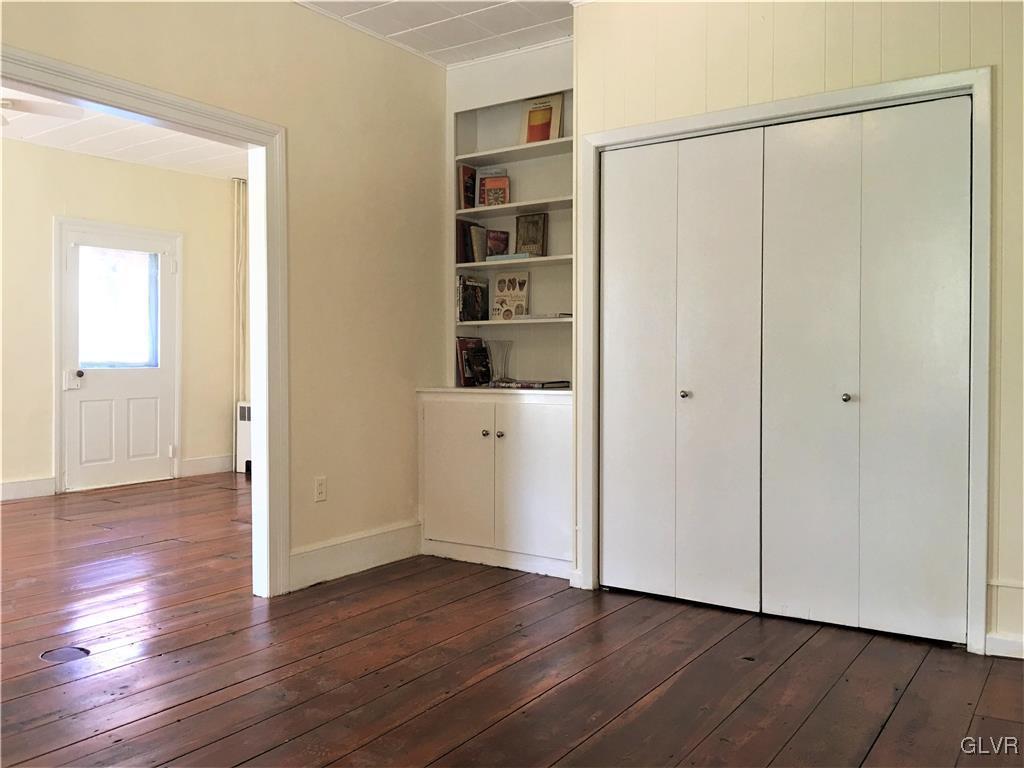 3070 Springtown Road Coopersburg, PA 18036 - Photo 18 of 31 a view of an empty room with wooden floor and closet