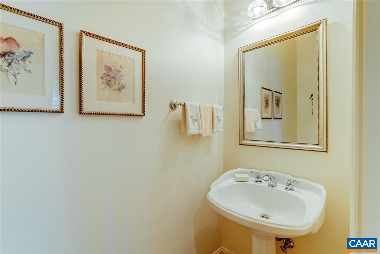 3159 Darby Road Keswick, VA 22947 - Photo 29 of 50 a bathroom with a sink and a mirror