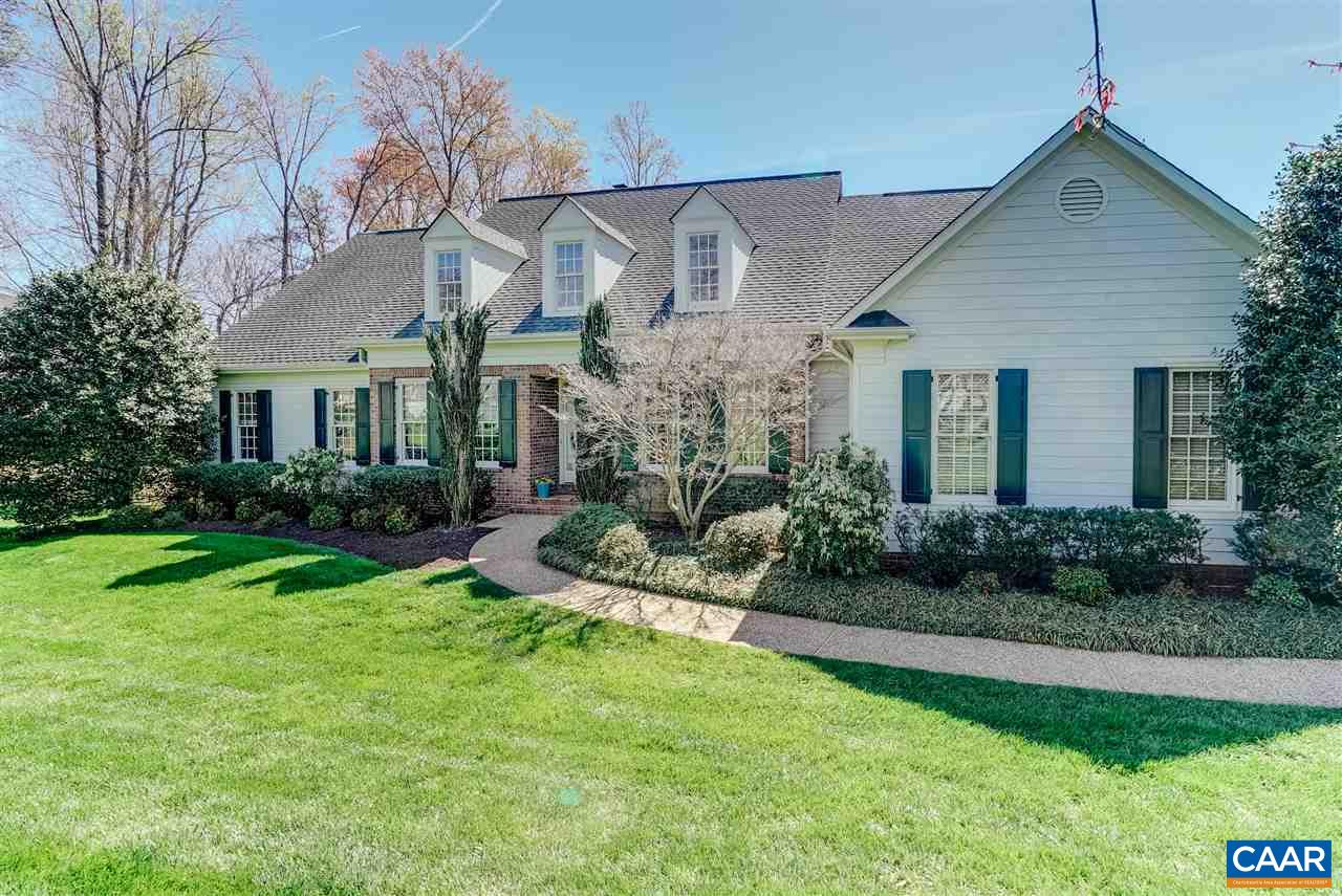 3159 Darby Road Keswick, VA 22947 - Photo 46 of 50 a front view of a house with a yard and potted plants