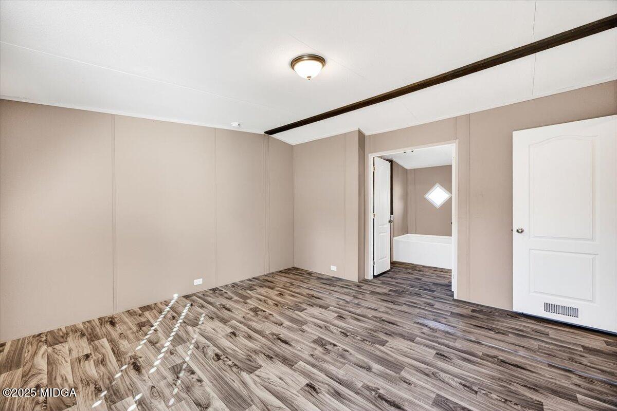 167 Mountain Springs Church Road Macon, GA 31217 - Photo 12 of 32 a view of a big room with wooden floor and closet