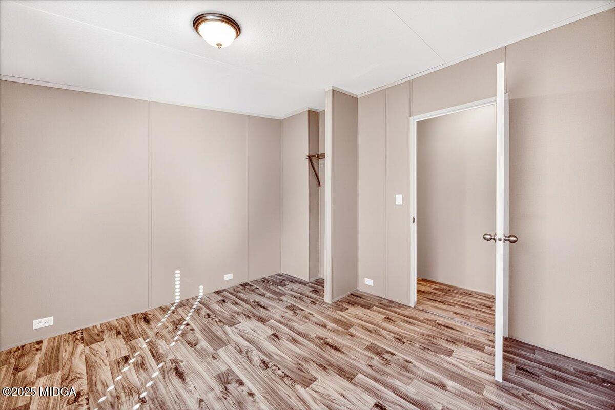 167 Mountain Springs Church Road Macon, GA 31217 - Photo 18 of 32 a view of a room with wooden floor and closet