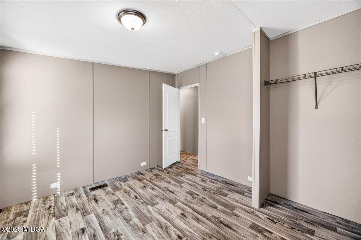 167 Mountain Springs Church Road Macon, GA 31217 - Photo 21 of 32 a view of a room with a bedroom