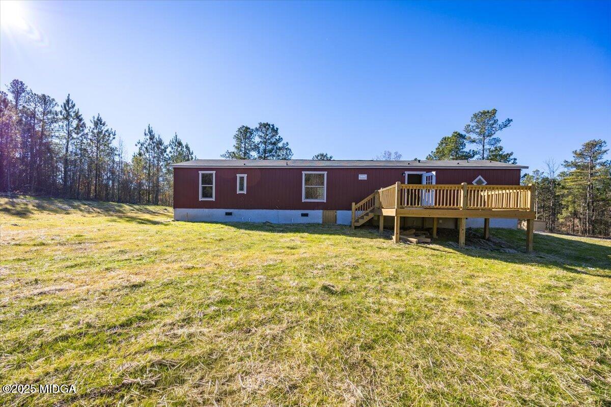 167 Mountain Springs Church Road Macon, GA 31217 - Photo 28 of 32 a view of a swimming pool with an outdoor seating