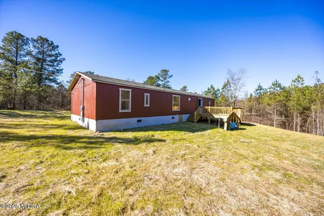 a swimming pool with a yard