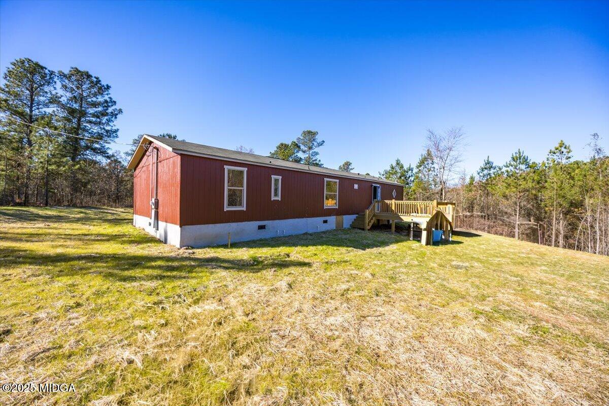 167 Mountain Springs Church Road Macon, GA 31217 - Photo 29 of 32 a swimming pool with yard