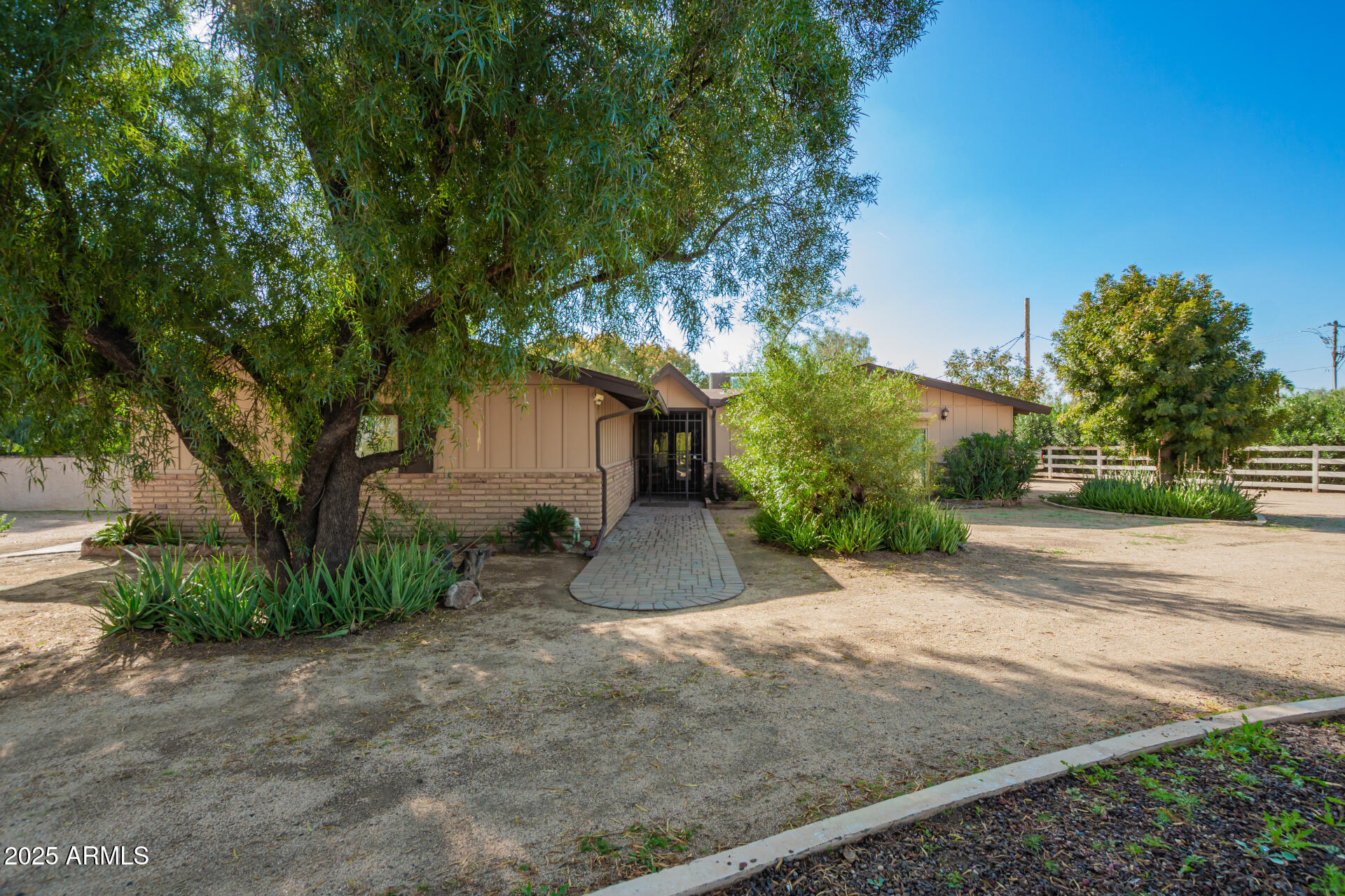 a view of a house with a yard and garage