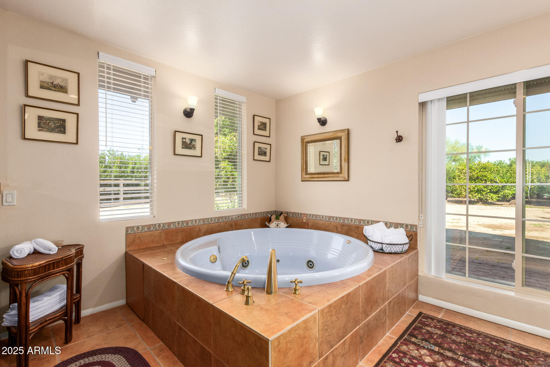 6419 East Cactus Road Scottsdale, AZ 85254 - Photo 17 of 38 a view of a bathtub in a room