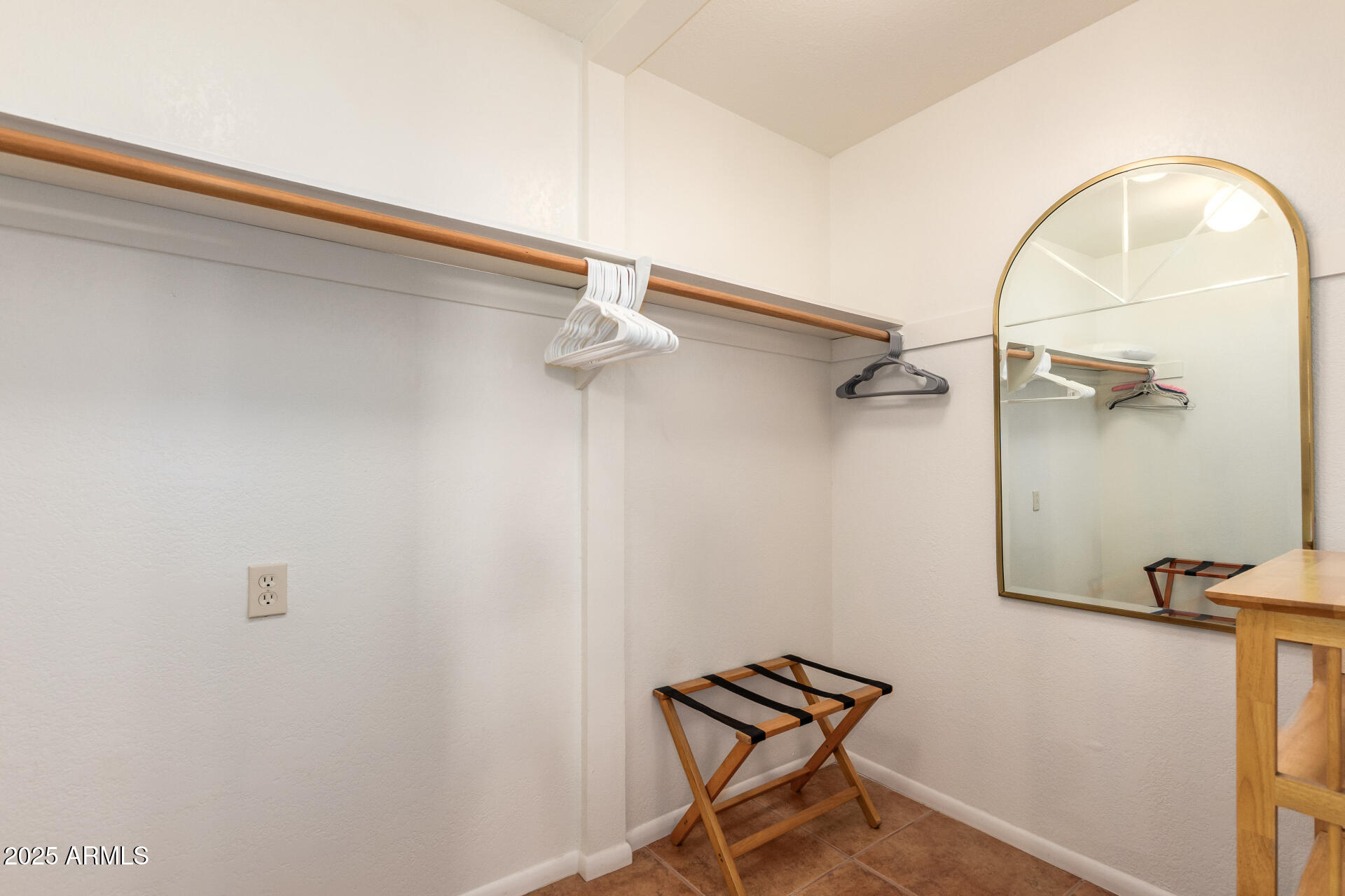 6419 East Cactus Road Scottsdale, AZ 85254 - Photo 21 of 38 a bathroom with a sink and mirror
