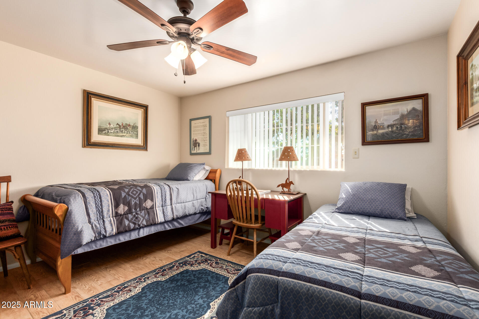 6419 East Cactus Road Scottsdale, AZ 85254 - Photo 22 of 38 a bedroom with bed couch and window