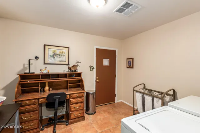 a view of a livingroom with furniture