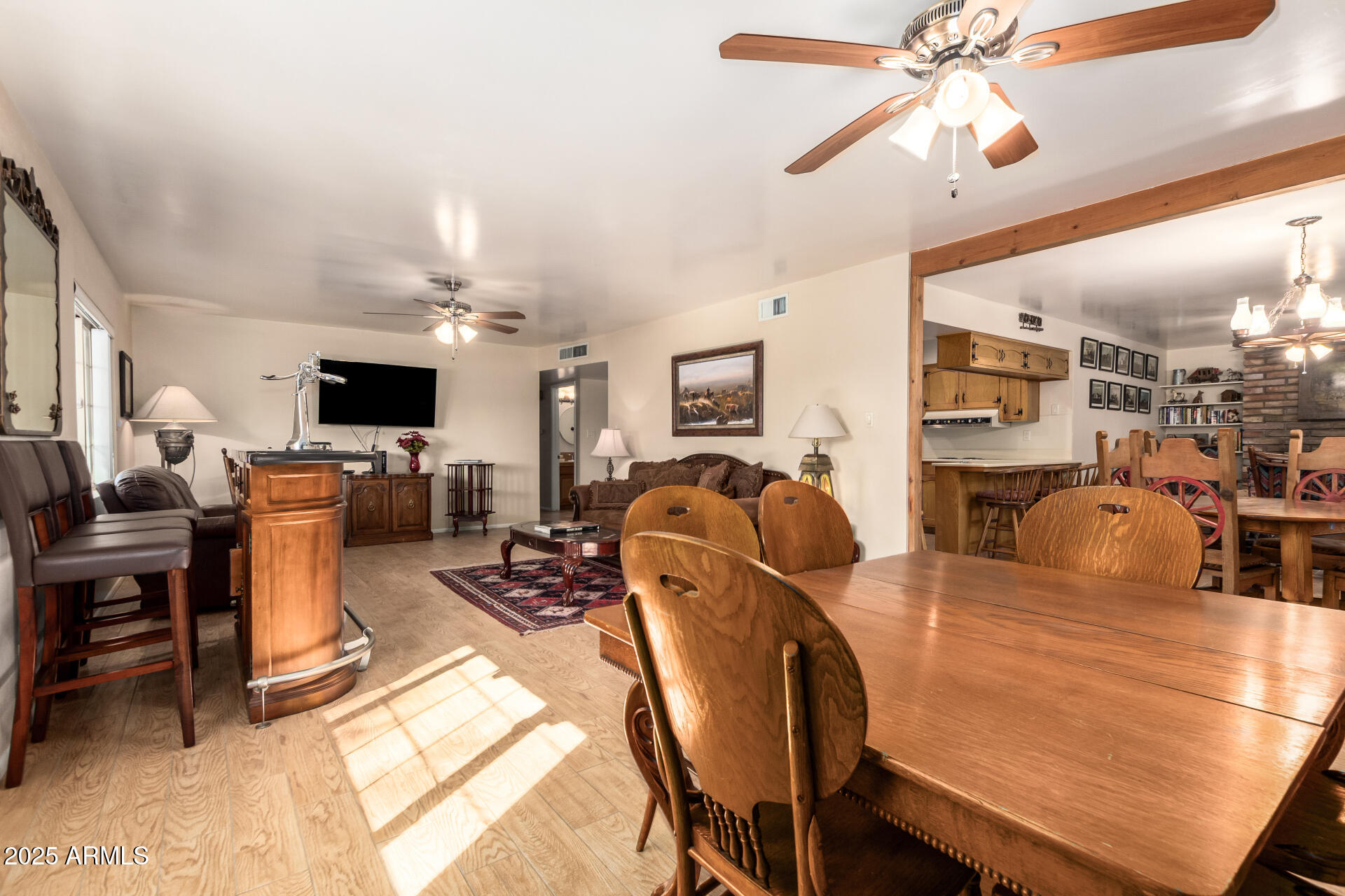 6419 East Cactus Road Scottsdale, AZ 85254 - Photo 8 of 38 a view of a dining room with furniture