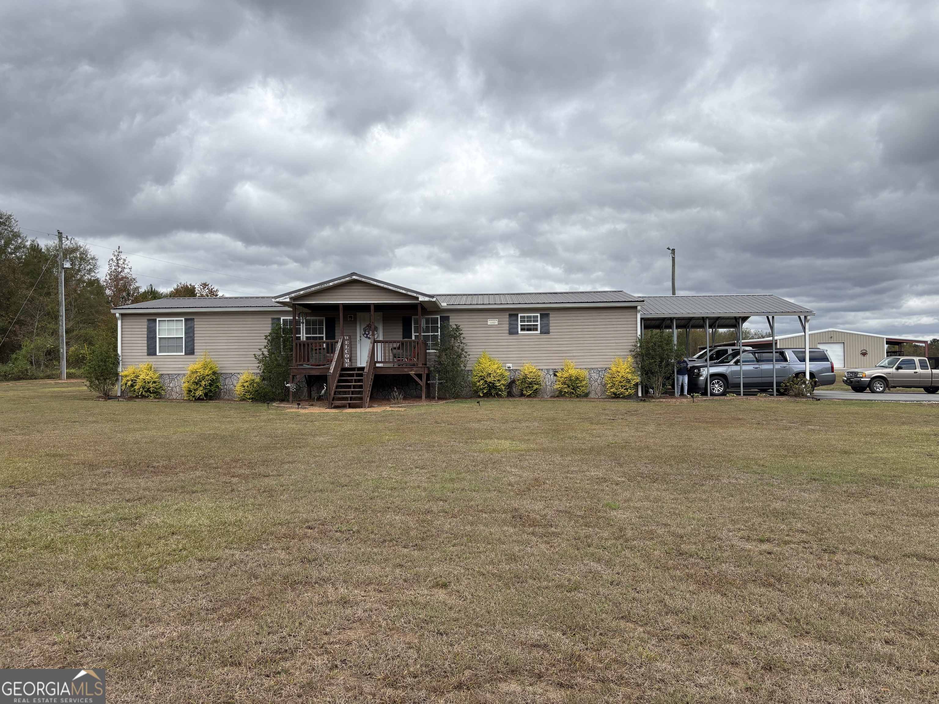 a view of building with car parked