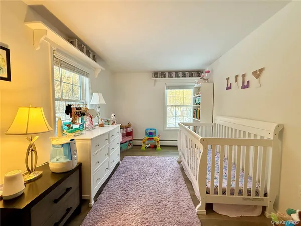 a large white room with a white couch
