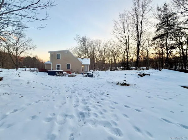 a view of the snow on the road