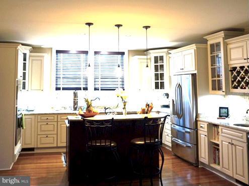 4048 Rectortown Road Marshall, VA 20115 - Photo 13 of 30 a kitchen with stainless steel appliances granite countertop a sink stove and refrigerator
