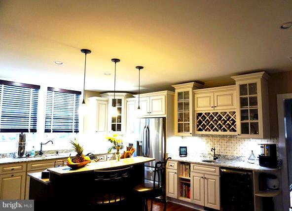4048 Rectortown Road Marshall, VA 20115 - Photo 15 of 30 a kitchen with a sink stove and cabinets
