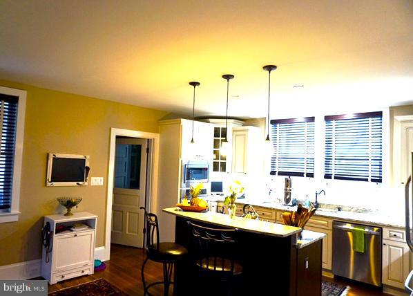 4048 Rectortown Road Marshall, VA 20115 - Photo 16 of 30 a kitchen with lots of counter top space and dining table