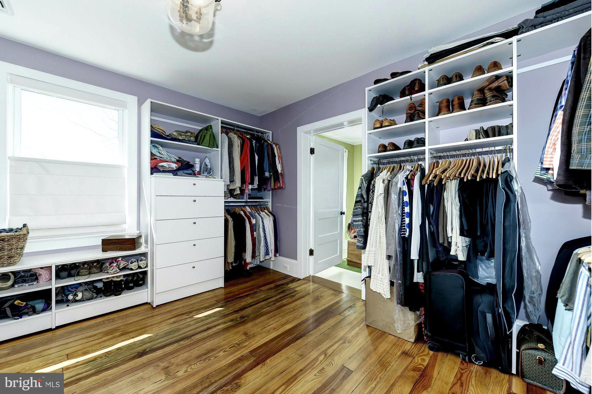 4048 Rectortown Road Marshall, VA 20115 - Photo 20 of 30 a view of walk in closet with clothes and shoes