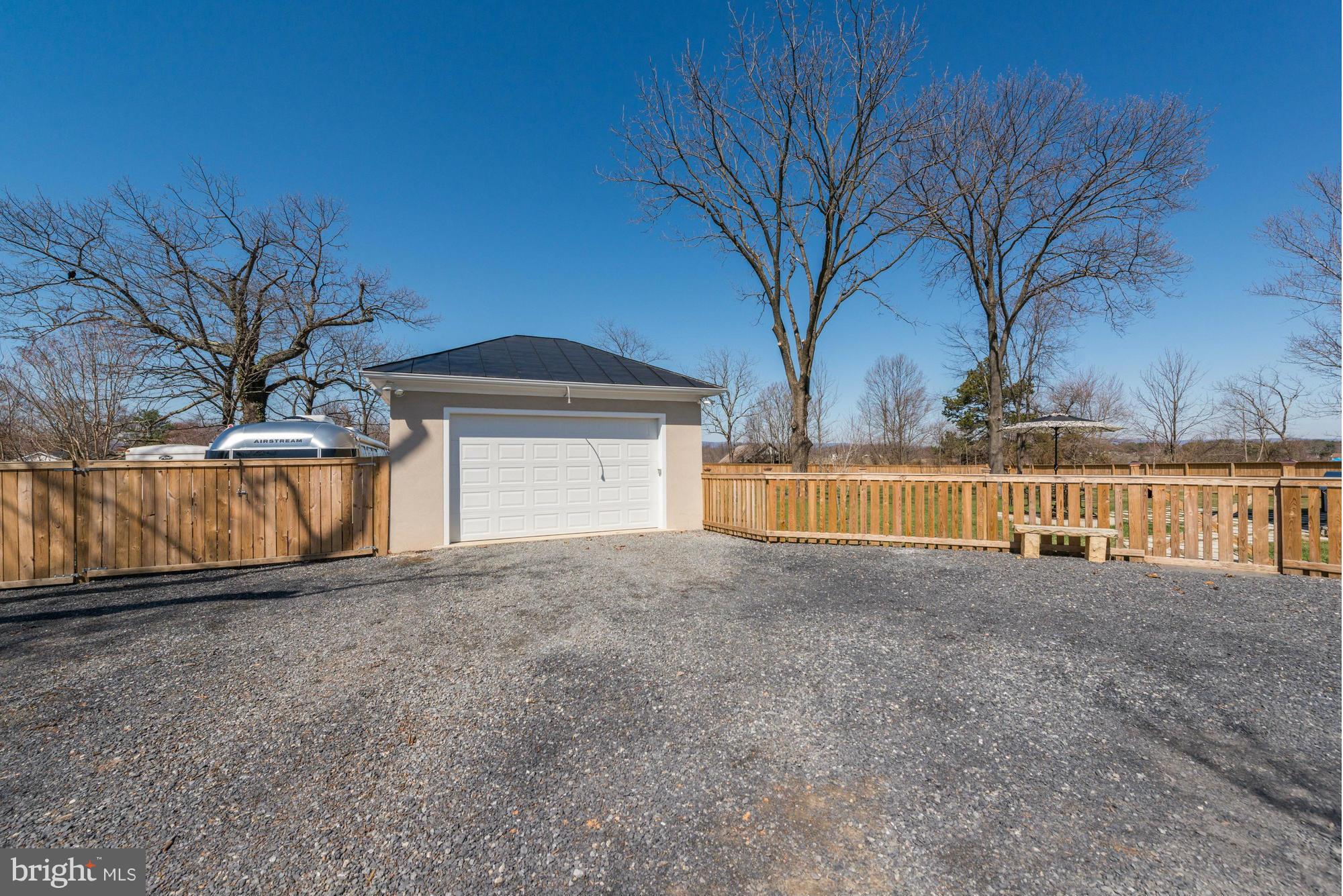 4048 Rectortown Road Marshall, VA 20115 - Photo 3 of 30 a view of a house with a yard and garage