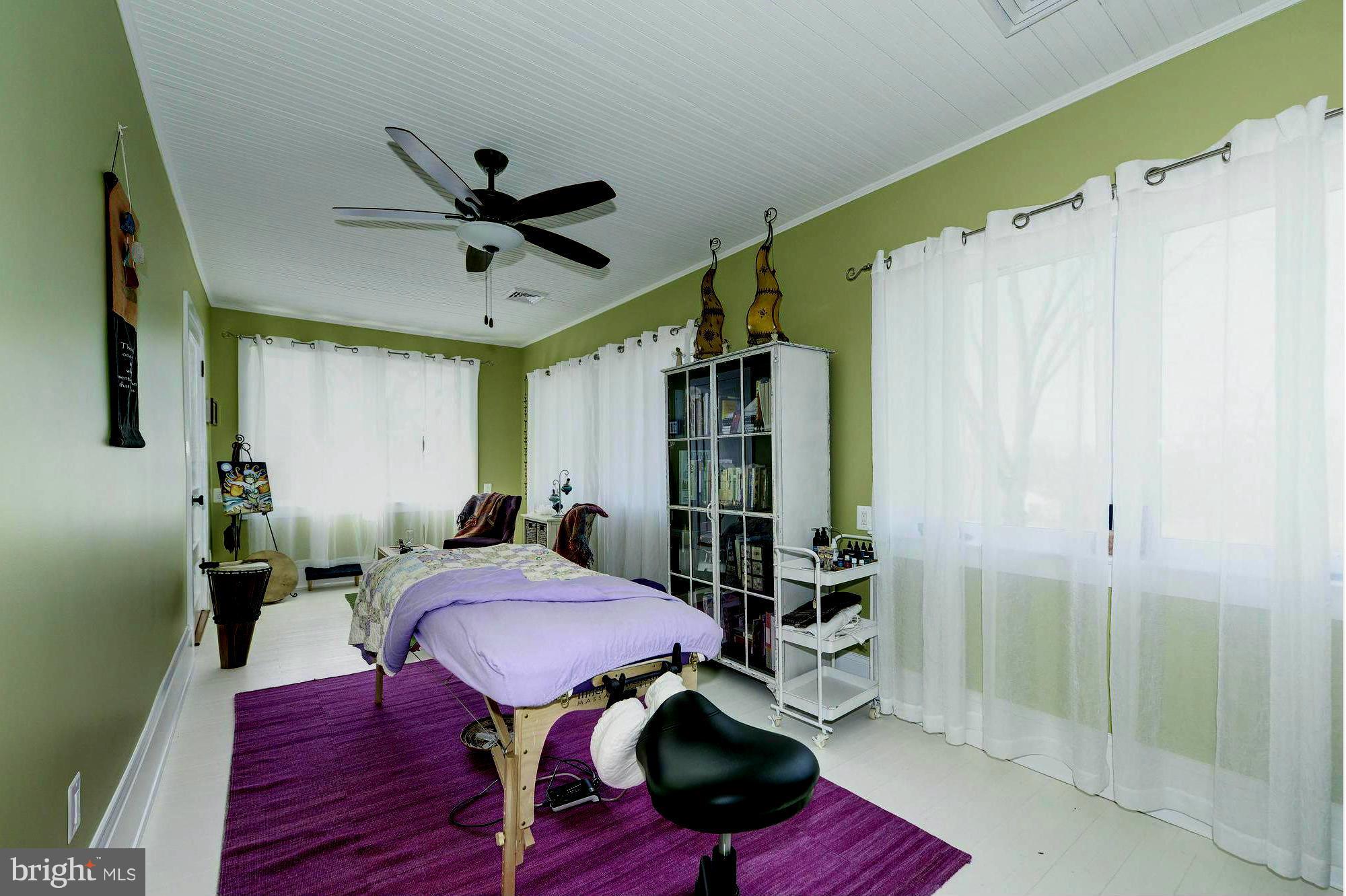 4048 Rectortown Road Marshall, VA 20115 - Photo 26 of 30 a view of a livingroom with furniture and a table wooden floor