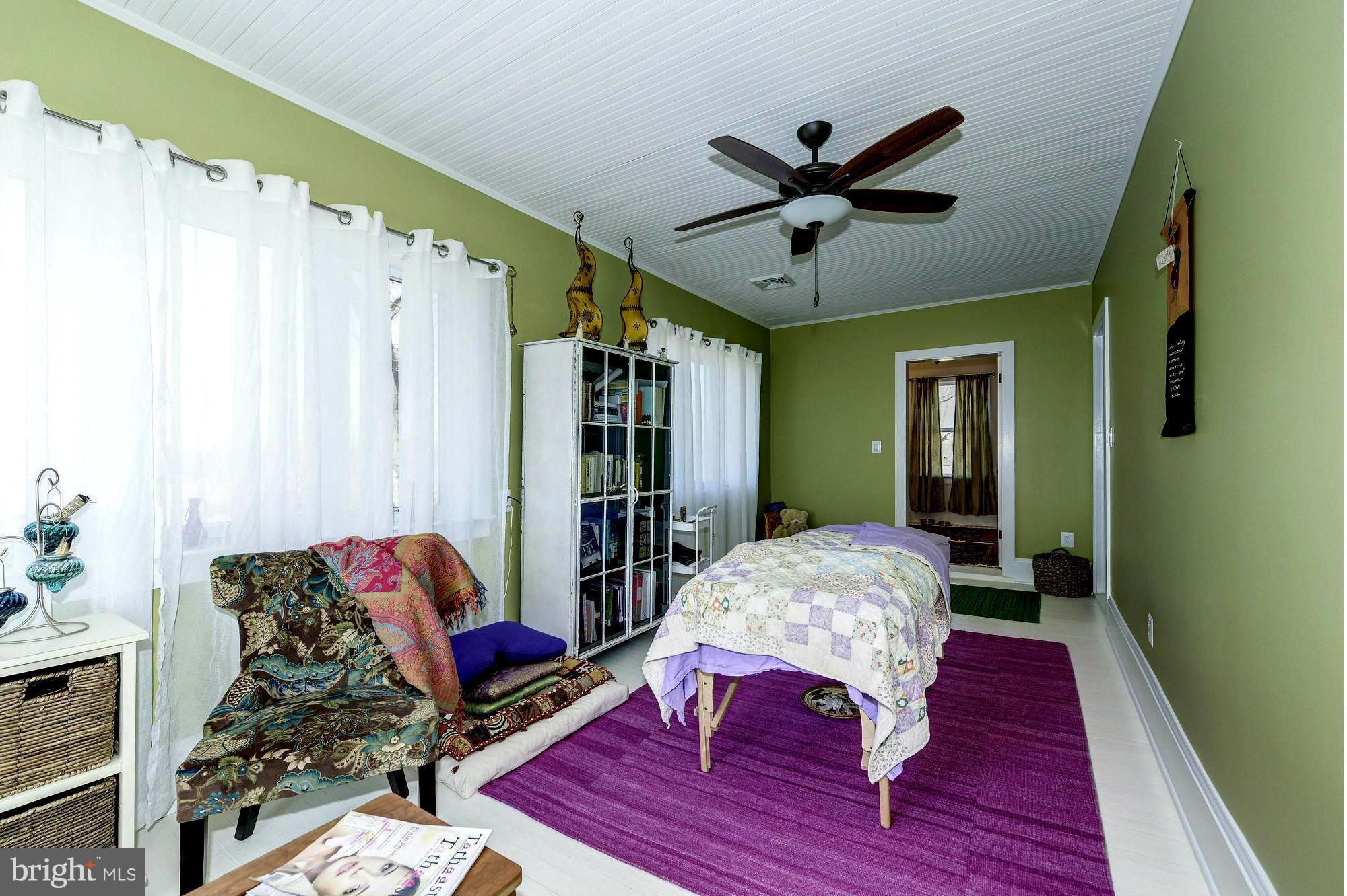 4048 Rectortown Road Marshall, VA 20115 - Photo 27 of 30 a living room with furniture and a wooden floor