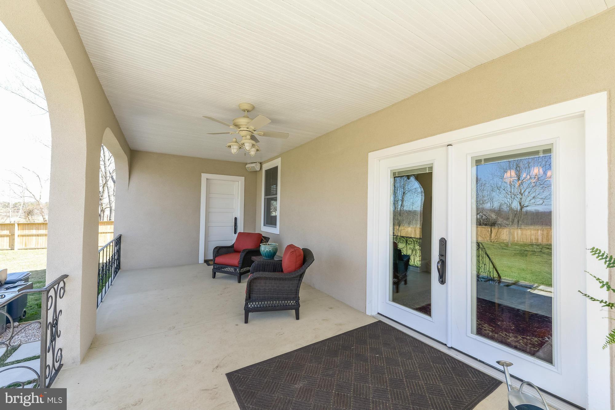 4048 Rectortown Road Marshall, VA 20115 - Photo 7 of 30 a living room with furniture a piano and a potted plant