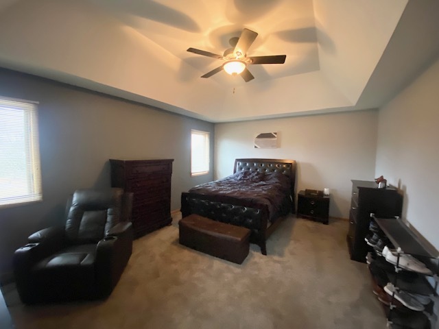 1702 Elm Street Spring Grove, IL 60081 - Photo 12 of 30 a bedroom with a bed and furniture