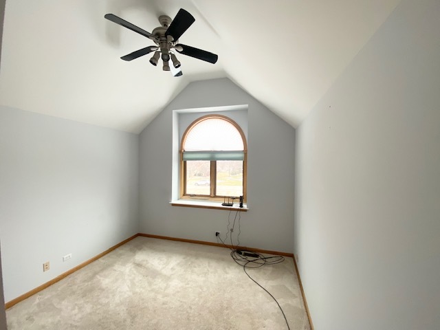 1702 Elm Street Spring Grove, IL 60081 - Photo 19 of 30 an empty room with a window and a fan